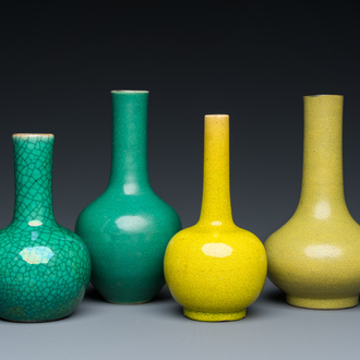 Four Chinese monochrome green and yellow bottle vases, 19/20th C.