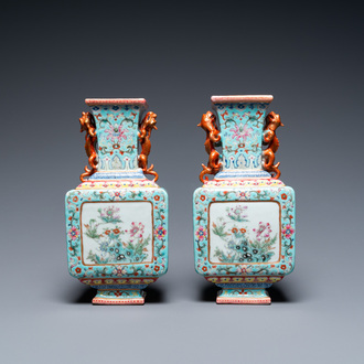 A pair of Chinese famille rose turquoise-ground vases, Qianlong mark, 19/20th C.