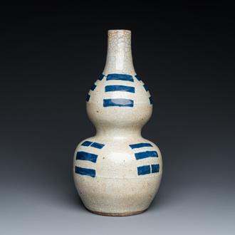 A Chinese blue and white crackle-glazed double gourd 'trigrams' vase, probably  Ming