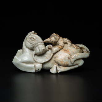 A Chinese greyish green jade 'horse and monkey' carving, probably Ming