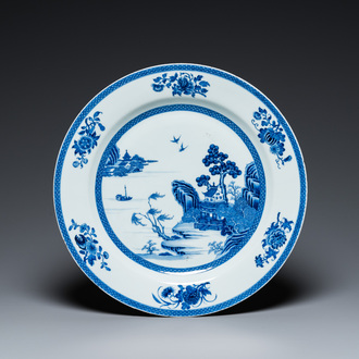 A large Chinese blue and white dish with a fine landscape, Qianlong