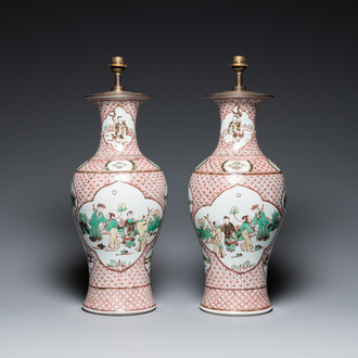 A pair of Chinese wucai vases with figurative design, 19th C.