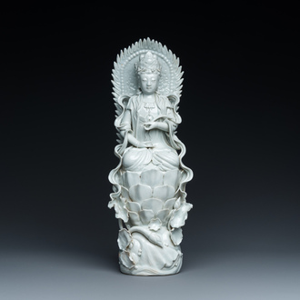 A Chinese Dehua blanc de Chine sculpture of Guanyin on a lotus throne, 19/20th C.