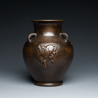 An extremely rare Chinese inlaid relief-modelled bronze 'hu' vase, Xuande mark, late Ming