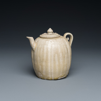 A Vietnamese beige-green-glazed melon-shaped ewer and cover, Lý, 11/13th C.