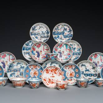 Sixteen Chinese famille rose and Imari-style saucers and seven cups, Kangxi and later