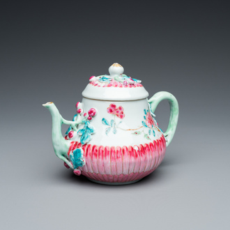 A Chinese famille rose 'lotus' teapot and cover, Yongzheng