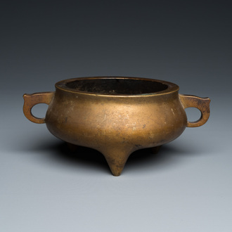 A Chinese bronze tripod censer, Xuande mark, 18th C.