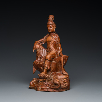 Een Chinese houten sculptuur van de zittende Tara, 19e eeuw
