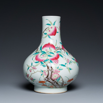 A Chinese famille rose 'nine peaches' bottle vase, 19th C.