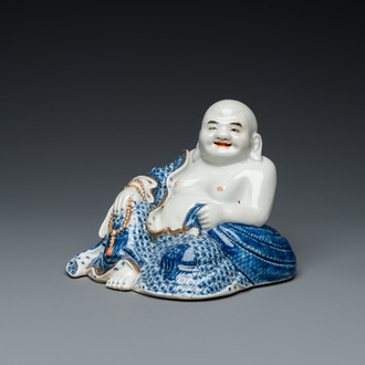 A Chinese blue and white seated Buddha, You Lin Ji Zao 游林記造 mark, Republic