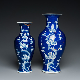 Two Chinese blue and white 'prunus' vases with kintsugi repairs, Qianlong mark, 20th C.