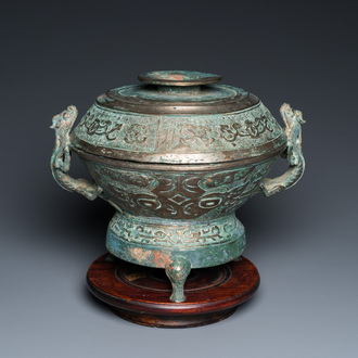 A Chinese inscribed archaistic bronze tripod censer and cover, Ming