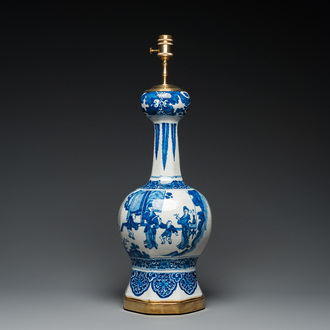 A large Dutch Delft blue and white chinoiserie vase mounted as a lamp, 1st quarter 18th C.