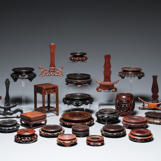 25 Chinese wooden stands, 19/20th C.