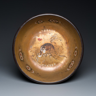 A large Chinese Fuzhou or Foochow lacquer 'tiger' bowl, inscribed 'xin qi chun', 19/20th C.