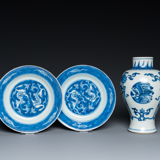 A Chinese blue and white 'cranes' vase and a pair of plates, Kangxi