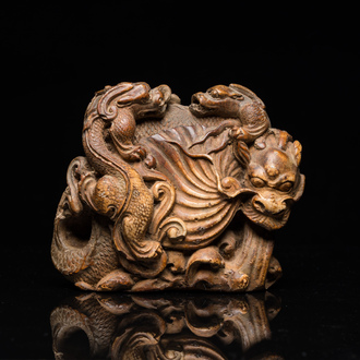 A Chinese soapstone 'dragons' group, 19th C.