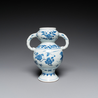 A Chinese blue and white vase with floral design, Transitional period