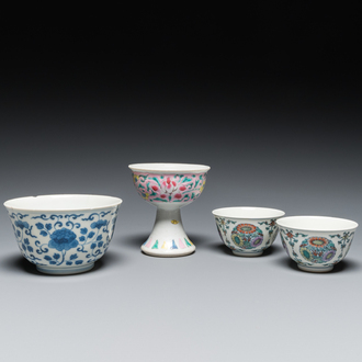 A Chinese famille rose stem cup, a blue and white bowl and a pair of doucai bowls, Yongzheng and later