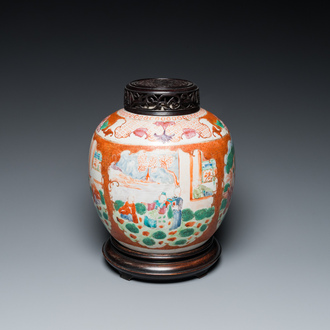 A Chinese famille rose 'mandarin subject' jar with wooden cover and stand, Qianlong/Jiaqing