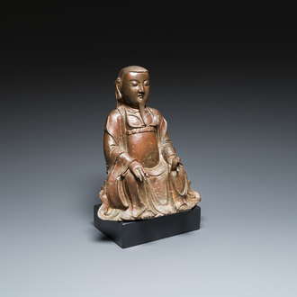 Een Chinese bronzen Zhen Wu met sporen van lakwerk, Ming