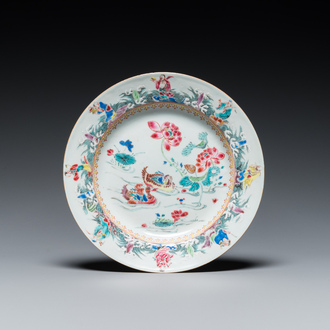 A Chinese famille rose plate with immortals and mandarin ducks, Yongzheng