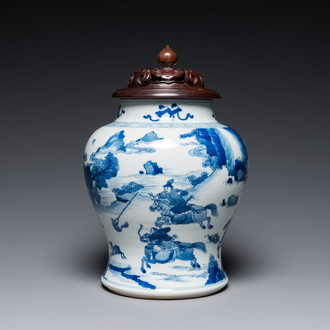 Vase en porcelaine de Chine en bleu et blanc à décor d'une scène de chasse, Kangxi