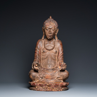 A gilded and lacquered wood sculpture of a praying ascetic, probably Thailand, 18th C.