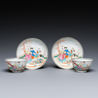 A pair of Chinese famille rose 'European subject' cups and saucers, Qianlong