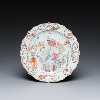 A Chinese famille rose 'mandarin tea drinkers' plate, Qianlong