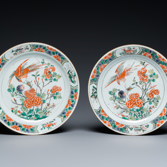 A pair of Chinese famille verte plates with a bird above a peony bush, Kangxi