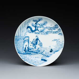 Assiette en porcelaine de Chine en bleu et blanc à décor d'une scène fluviale, Yongzheng