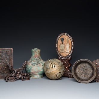 A varied collection of Chinese and Tibetan bronze, brass and wood objects, 19/20th C.