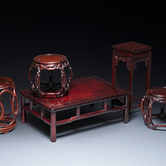 Five Chinese well-carved wooden stands, 20th C.