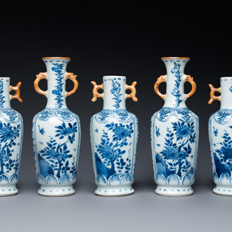 A Chinese blue and white garniture of five vases with floral design, Kangxi