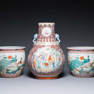 A Chinese famille rose 'hu' vase and a pair of fish bowls, 20th C.