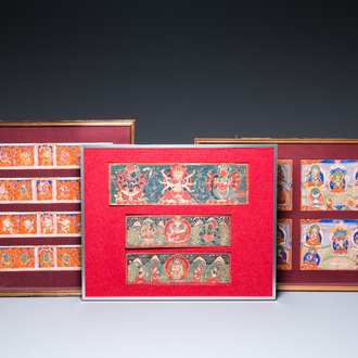 Eight tsaklis and three painted wood book covers, Tibet, 19th C.