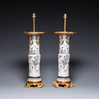 Paire de vases en porcelaine de Chine famille rose montés en lampes en bronze doré, Yongzheng