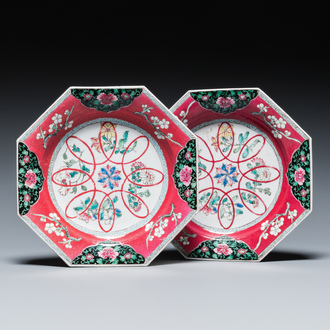 A pair of Chinese octagonal famille rose ruby-ground plates, Yongzheng