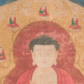 Ecole chinoise: 'Bouddha debout sur deux fleurs de lotus', encre et couleurs sur soie, 18/19ème