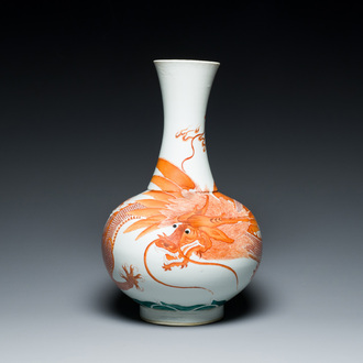 A Chinese iron-red 'dragon' bottle vase, 19th C