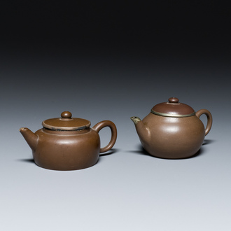 Two Chinese Yixing stoneware teapots and covers with brass mounts, one with Yigong 逸公 seal mark, 19/20th C.