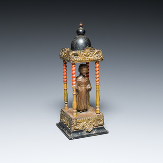 An Italian carved wood figure of a monk mounted in a later pagoda, 14th and 19th C.