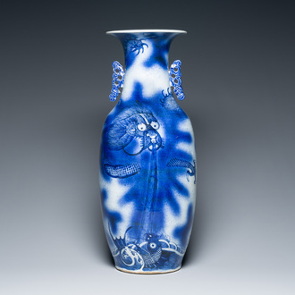 A Chinese blue and white 'dragon and carp' vase, 19th C.