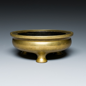 A Chinese bronze tripod censer, Xuande mark, 18th C.