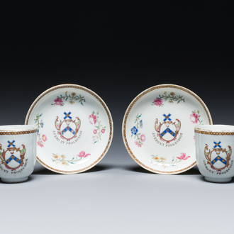 A pair of Chinese famille rose English market cups and saucers with the arms of Pringle of Whytbank, Qianlong