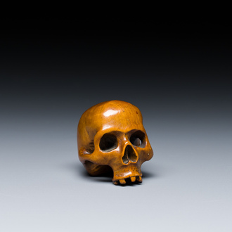 A German carved boxwood Vanitas or Memento Mori skull, 17th C.