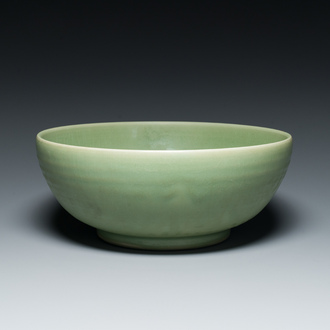 A Chinese Longquan celadon bowl with underglaze floral design, Ming
