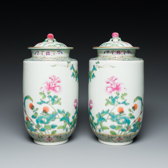 A pair of Chinese famille rose vases and covers with floral design, Jiaqing mark, Republic